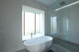 Master bathroom with backlit pop out wind boxes.