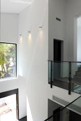 Hallway double height interior  Photo 6 of 7 in House in Stamata by design and structures