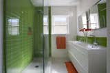 Bath Room, Glass Tile Wall, and Ceramic Tile Floor  Search “kitchenbacksplashes--glass-tile” from Green Glass Bathroom