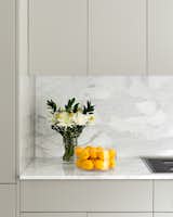 Kitchen, Stone Slab Backsplashe, Colorful Cabinet, Marble Counter, and Stone Counter  Photos from Boerum Hill Brownstone