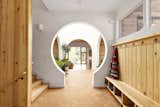 A keyhole doorway marks the boundary between public and private sides of the house.
