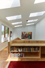Office, Study Room Type, Bookcase, Light Hardwood Floor, Shelves, and Medium Hardwood Floor  Photo 2 of 14 in Merion House by Assembly Architecture & Build, PLLC