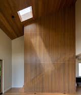 Staircase and louver screen off living room