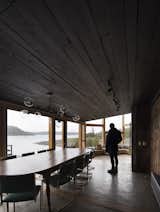 Dining Room, Concrete Floor, and Ceiling Lighting  Photo 20 of 25 in Pollo House by Ortuzar Gebauer Architects