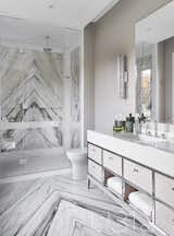 Bath Room, Recessed Lighting, Enclosed Shower, Drop In Sink, Wall Lighting, Marble Floor, Marble Counter, One Piece Toilet, Marble Wall, and Accent Lighting Guest bathroom  Photo 15 of 15 in Country Estate by U31 Design
