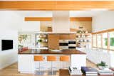Kitchen, Open, Wood, Refrigerator, Microwave, Wall Oven, Range Hood, Ceiling, Wood, Quartzite, Subway Tile, Light Hardwood, Drop In, and Brick  Kitchen Drop In Microwave Wall Oven Wood Subway Tile Ceiling Photos from Montecito