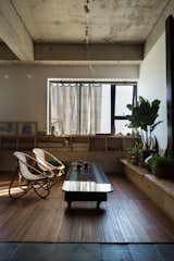Living Room, Coffee Tables, Floor Lighting, Wall Lighting, Chair, and Medium Hardwood Floor  Photo 6 of 24 in 1110 apartment by atelier 12