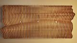 Detail of undulating wood ceiling panel