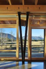 Distinctive steel "V" columns support the exposed wood beams