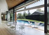Interior view of dining space with 20-ft wide opening to pool