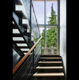 Staircase, Metal Railing, and Wood Tread View of stair  Photo 2 of 14 in Bainbridge House by FINNE Architects