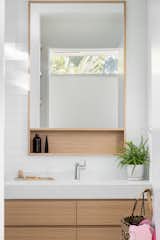 Bath Room, Concrete Counter, Porcelain Tile Floor, One Piece Toilet, Recessed Lighting, Glass Tile Wall, Ceiling Lighting, Open Shower, and Wall Mount Sink  Photo 19 of 28 in Bayview House by Leader Design Studio