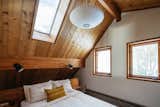 Master bedroom featuring Herman Miller and Schoolhouse Electric lighting