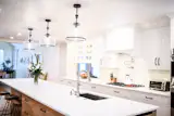 Light fixtures by Shades of Light and countertop by Cambria 