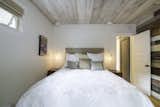 Don't you just want to dive onto this bed? The long pendants keep the bedroom unique, with a very practical use!