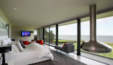 The upper levels show off some incredible design and sweeping waterfront views.