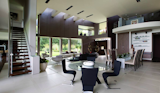 The home features three kitchens, which include one Eggersman designed kitchen, a working kitchen with Gaggenau, Miele, and Sub Zero appliances and an outdoor kitchen.
