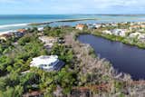 Hideaway Beach Club is a private gated community situated directly on the Gulf of Mexico with boardwalks at natural lagoons, shelling, fishing, a sports center complex, and a Gulf front Beach Club.