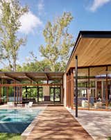 Exterior, House Building Type, Wood Siding Material, Glass Siding Material, and Flat RoofLine  Photo 5 of 14 in Lake Austin Residence by A Parallel Architecture