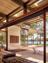 Exterior, House Building Type, Wood Siding Material, Flat RoofLine, and Stone Siding Material  Photo 6 of 14 in Lake Austin Residence by A Parallel Architecture