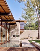 Exterior, Stone Siding Material, Flat RoofLine, and House Building Type  Photo 10 of 14 in Lake Austin Residence by A Parallel Architecture