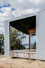 Cumulus Studio: "Matt & Eloise Collins wanted a home with a small, sustainable footprint and smart use of space. We collaborated closely with Matt, who built Darkwood himself on a steep, but stunning site in rural Tasmania. Amazing scenes of the Tamar River from the front deck."