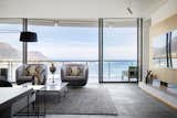 Living Room, Floor Lighting, Chair, and Coffee Tables  Photo 8 of 13 in Seafront Apartment by OKHA Design & Interiors