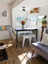 We gutted the exhausting sofa and table that were so bulky and outdated. I shopped smart and found tiny pieces for a great price. I also updated all of our lighting with designer lighting from @lucentlightshop 