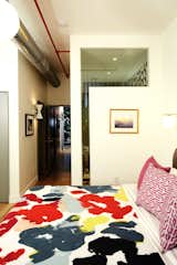 Bedroom, Medium Hardwood Floor, and Bed  Search “bedroomfloors--medium-hardwood” from Harlem Townhouse