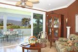 Living Room, Sofa, Ceiling Lighting, Ceramic Tile Floor, End Tables, and Coffee Tables Entertain from Awesome View Living Room/Dining Room/Lanai   Photo 3 of 21 in Five Bedroom Ocean View Hawaii House by Beth Dudas