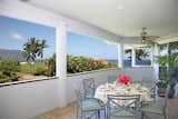 Outdoor Large View Lanai equipped with 3 tables for Seating Up to 30 for your Reunion!  Photo 6 of 21 in Five Bedroom Ocean View Hawaii House by Beth Dudas
