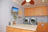 Large Separate Walkin Laundry Room even has 1 of 9 Flat Panel TVS in Home!
