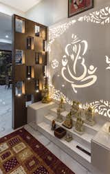 Puja space designed to give a spiritual ambience allowing a continuous cycle of energy flow throughout the house.