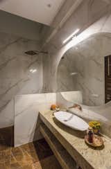 The toilets located in the central portion of the house were provisioned with skylights; a peculiar feature as observed in the surrounding context; for penetration of daylight along with appropriate ventilation, thus, developing a connection with the outdoor environment.