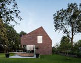 Exterior, Brick Siding Material, Metal Roof Material, House Building Type, and Shed RoofLine  Photos from Villa IJsselzig