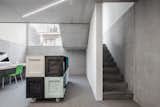 Office, Desk, Chair, Storage, Lamps, Concrete Floor, and Carpet Floor  Photo 16 of 23 in Private House and Architecture Office by Daphné Römer