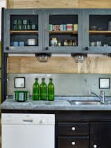 Kitchen and Metal Counter  Photo 3 of 17 in Authentic Loft in a Former School by Katalin Baracsi