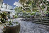 Front courtyard sets a peaceful ambiance around the home