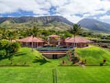 Commanding view of the home and tennis court.