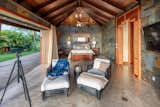 One of three master bedrooms. Note the pocket doors retract to blend indoor/outdoor living space.