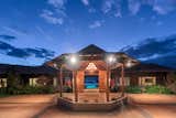 An illuminated entrance as the sun sets.