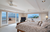 Master bedroom has view of Diamond Head and oversized lanai