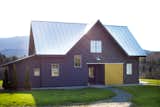 Exterior, Metal Roof Material, Farmhouse Building Type, Wood Siding Material, Gable RoofLine, and House Building Type West facade entry path.   Photo 15 of 15 in Modern Vermont Farmhouse by Lindsay Selin Photography