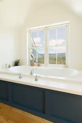 Bath Room, Light Hardwood Floor, and Alcove Tub Master Bath  Photo 1 of 22 in Contemporary Vermont Farmhouse by Lindsay Selin Photography