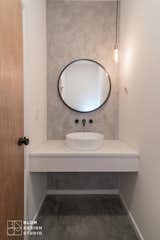 Bath Room, Engineered Quartz Counter, Concrete Floor, Pendant Lighting, and Vessel Sink  Photo 12 of 14 in Traxler 1 by BLOM Design Studio