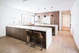 Kitchen, White Cabinet, Wood Cabinet, and Pendant Lighting  Photo 8 of 14 in Roof Garden in West Hollywood by AUX Architecture
