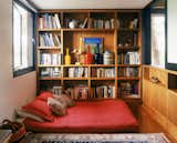 Bedroom, Shelves, Storage, Bookcase, Medium Hardwood, Bed, and Rug  Bedroom Bed Rug Medium Hardwood Bookcase Photos from 700 Palms