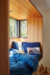 Extruded bay windows become sleeping nooks for the kids.