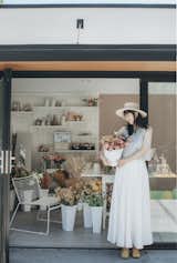 Ogawa Fisher's client, Di, has a thriving side business as a floral designer and is the owner of an online boutique, Slow Sunday, selling modern, minimalist Japanese wares. She works out of the newly converted garage. 