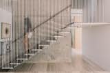 Staircase, Wood Tread, Metal Railing, and Cable Railing Staircase  Photo 17 of 34 in The Window House by formzero